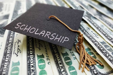 Scholarship graduation cap with cash